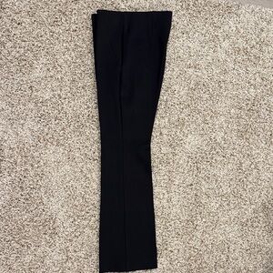 Chico's Black Juliet bootcut pant in size 6. Missing price tag but never worn.